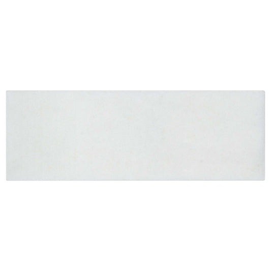 The Finish Line in Regency White 3x9 Natural Stone